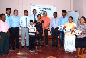 The picture shows the initial four families selected from Bathiyagama, Kantalai  who were educated on the Android Village Hub initiative and amongst them were Etisalat Lanka - Head of Prepaid and Brand Marketing, Shameel Bishri, Head of Human Resources, Srinath Fonseka, Head of Corporate Communications, Pradeep Carvalho, Regional Business Manager, Suresh Mohamed and from Sarvodaya Fusion - Managing Director, Dr. Harsha Liyanage, Coordinator Mobile4D Projects, Udara Dharmasena and Coordinator - Sarvodaya Resource Centre Kantalai, Sunil Wickramarachchi.