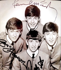 Phenomenon: An autographed photo of The Beatles is displayed at an exhibition(Reuters)
