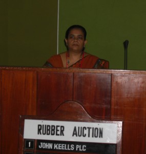Pic shows Ms. Mekala Wanigasuriya  auctioning a rubber lot.