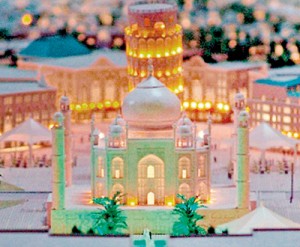 In miniature: A model shows the Taj Arabia complex with the Leaning Tower of Pisa behind