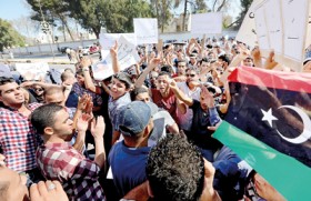 Shadow fighting erupts over Gaddafi