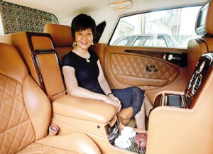 Bufori owner Tan eHong sits in her Bufori Geneva, which is fitted with a tea-making feature, at her residence in Kuala Lumpur (REUTERS)