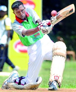 A Panadura Royal player in action against Maris Stella yesterday. - Pic by Amila Gamage