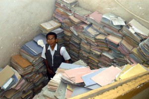 Worker inside a record room