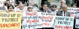 Placard carrying lawyers’ demonstration outside the superior courts complex in Hulftsdorp protesting the attack on the JSC Secretary. Pic by Athula Devapriya