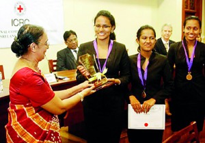 The Vice Chancellor of the University of Colombo Professor Kshanika Hirimburegama giving away the Championship trophy to APIIT National Champions.— atSenate Room, College House, University of Colombo.