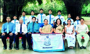 Seated (from left): Mahesh Ekanayake (Head Coach), Peter Nanayakkara (COO), Senani Ranasinghe (Director Sports), Nirmalie Saparamadu (Chairperson OKI), Mona Dharmawardane (Principal), Thilina Wijesekara (TIC), Vijitha Hettiarachchi (Coach). Standing (from left): Chavindu Kavihska, Dinuwan Fernando, Induka Pulasti, Rukshan Babu, Sirimevan Peiris, Janith Fernando, Aishwarya Ravichandran, Dulaksha Rajapaksha.