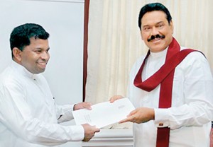 Former Eastern Province Chief Minister Sivanesathurai Chandrakanthan alias Pillayan  receiving his appointment letter as an Advisor to President Mahinda Rajapaksa.