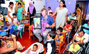 Drysdale shares a moment with the children at the Cerebral Palsy Foundation in Wattala. Pic by Nilan Maligaspe