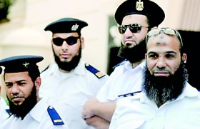 Sacked for growing beards, Egyptian police demand jobs back