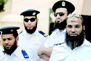 Bearded policemen take part in a protest in Cairo (REUTERS)