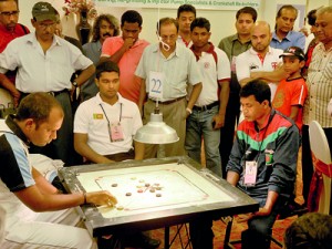 Indian carrom ace Yogesh Paradeshi (left) in action against Hemet Molla of Bangladesh. - Pic by Amila Gamage