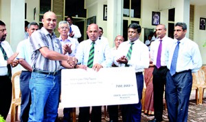 In the photograph the OBA , President  Chandana Perera accepts the cheque from Srinath Karunarathne , Secretary - OBA of St. John’s College, Nugegoda branch in Australia. Also in the picture are Major D A D Wanaguru  ( Principal, of St John’s College, Nugegoda),Daya Wickkramarathne ( Vice Patron - OBA), Ajith Mahendra ( Immediate Past President - OBA), Anoj Thillakarathne ( Vice President - OBA), J M Mirshan ( Executive Committee Member of the OBA)