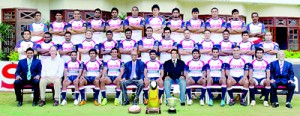 The 2012 Kandy SC squad and officials at their home ground at Nittawela.