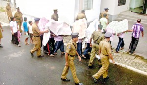 Suspects being brought to court. Pic by Krishan Jeewaka Jayaruk