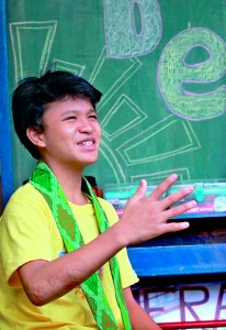 Cris Valdez, known as Kesz, gestures as he speaks during an interview with AFP at the compound of the child rights' advocacy group Club 8586 (AFP)