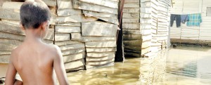 Outbreaks of water-borne diseases are common after heavy rains and floods, and there’s a lurking danger of snake bite.   Photo: Amila Gamage