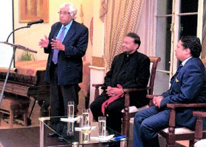 Dr. Fernando addressing the forum while Dr. Wijegoonewardene and High Commissioner Nonis look on