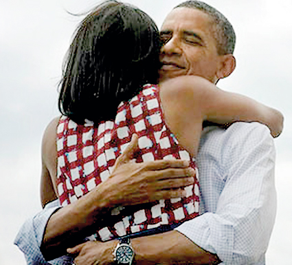 Barack-Obama-hugs-his-wife