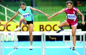 W.K.L.A. Nimali (in blue) of Sri Lanka Air Force went on to win the 400m Women’s Hurdles final.