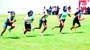Start of the 100m under 13 girls. At extreme left is the winner Anishra Odayar.