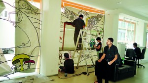 Above- “Agni Salaru” Interactive Multimedia Design exhibition held earlier this year, Mr. Nathan Ober oversees his students.