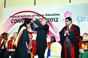 BSc student April Heenatigalle receiving the Gold Medal for best academic performance year 2012