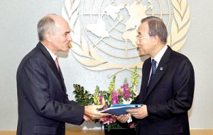 Secretary-General Ban Ki-moon receives the Independent Review Panel  Report on Sri Lanka from ASG Charles Petrie. UN Photo/Eskinder Debebe