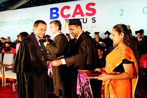 Student Receiving the award from Chairman BCAS Campus