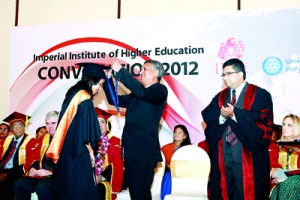 BSc student April Heenatigalle receiving a Gold Medal for best academic performance year 2012