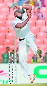 Tino Best delivers a ball during the fourth day of the second cricket Test match between Bangladesh and The West Indies at The Sheikh Abu Naser Stadium in Khulna on November 24, 2012