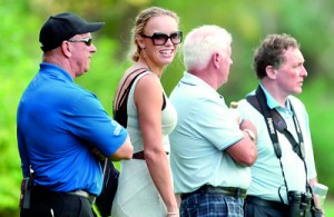 Tennis champion and golfer Rory McIlroy's girlfriend, Caroline Wozniacki (2nd L), of Denmark attends the second round of the DP World Tour Championship in the Gulf emirate of Dubai on November 23, 2012. The world's top two ranked players Rory McIlroy and Luke Donald were involved in a three-way tie at the top of the leaderboard at the halfway stage of the eight million dollar (6.2 million euros) DP World Tour Championship. AFP