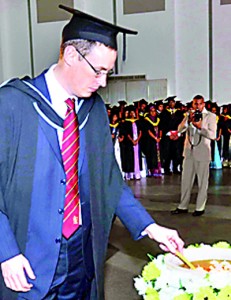 Mr. Lloyd Powell, The Head of Collaborative Provision- Cardiff Metropolitan University – UK, lighting the traditional oil lamp