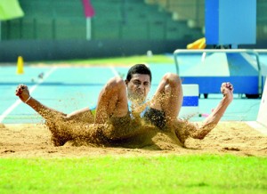 M. Dissanayake with a happy look after his successful long jump. - Pic Amila Gamage