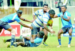 Air Force and Navy Gemunu clashed at the CR&FC ground, on the first day of the WPRFU Sevens. - Pic by Amila Gamage
