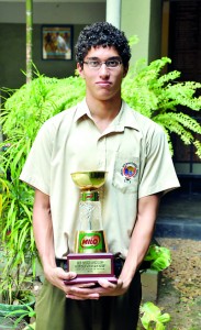 Mathew Abeysinghe with the Milo Schools Colours Award for Emerging Sports Personality