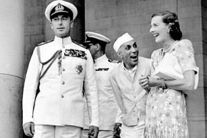Besotted: Edwina and India's PM Pandit Nehru share a joke as her husband,stands by