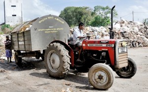 Today the local council has been reduced the status of the Government’s garbage collecting arm. Inset: Kesarralal Gunasekera