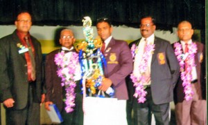 A.B. Elkaduwa, who was adjudged the best sportsman of the year (Centre) with the Chief guest and guests of honour, standing from left – Dampiya Wanasinghe (Principal) St. Thomas’ Matale, Edmund C. Wijesinghe (Chief guest), A.B. Elkaduwa (Best sportsman), M. Ratnaharan and Asitha Senanayaka, (guests of honour).