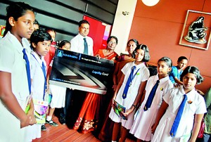 Mr. Rajiv Gunasena, Deputy Managing Director - M. D. Gunasena hands over the Loyalty Membership to Mrs. Sujatha Devendra – Vice Principal and students of Visakha Vidyala the first school to receive the Loyalty Membership