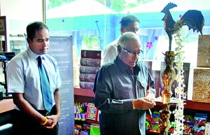 Mr. Percy Gunasena – Chairman M. D. Gunasena lighting the oil lamp.