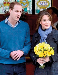 Royal couple: Kate, 30, emerged from the private hospital looking relaxed, carrying a bouquet of yellow flowers and giving a brief smile to the waiting press before being driven away with her husband Prince William