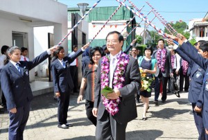 President of GCAC Prof. Wu  Wanmin being conducted at the Guard-of-Honour on arrival by  Mrs. Sherryn Yaseen Mangalagama CEO of ACHE