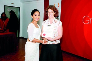 Ms.Harriet Gardner Assistant Director British Council presenting certificates