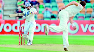 Tillakaratne Dilshan pulls a delivery from  Mitchell Starc on the second day of the first cricket Test match in  Hobart. - AFP