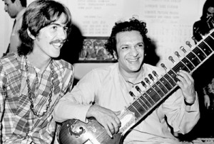 Eye Opening: George Harrison, of the Beatles, sits cross-legged with his musical mentor, Ravi Shankar of India, in Los Angeles in 1967