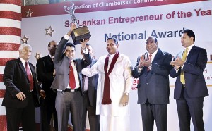 Seen here from left - Nalin Attyagalle (CEO) - FCCISL; Kumar Mallimaratchi s(President) -FCCISL; Nayana Dehigama (Platinum Winner 2012); Lal Keerthi Gunawardena (Platinum Winner 2011) and Managing Director Lucky Lanka (Pvt) Ltd; Shashindra Rajapaksha (Chief Minister)-Uva Province; Ajith Wattuhewa -(Senior Vice President) FCCISL nd W.K.H. Wegapitiya -(Vice President )FCCISL.