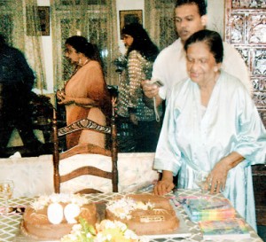 Celebrating a milestone: Mary Irene Chandraratne cuts her 90th b’day cake