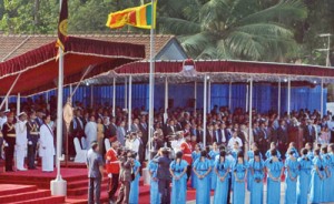 A past Independence Day celebration: Singing the National Anthem as the National flag is hoisted. (file pic)