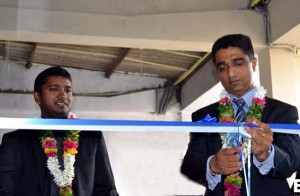 ESOFT, Chairman and managing Director Dr. Dayan Rajapaksa opening Jaffna Metro Campus. ESOFT, General Manager Nishan Sembacuttiaratchy looks on.